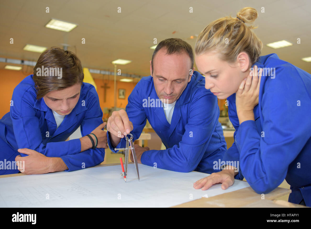 using a drafting compass Stock Photo Alamy