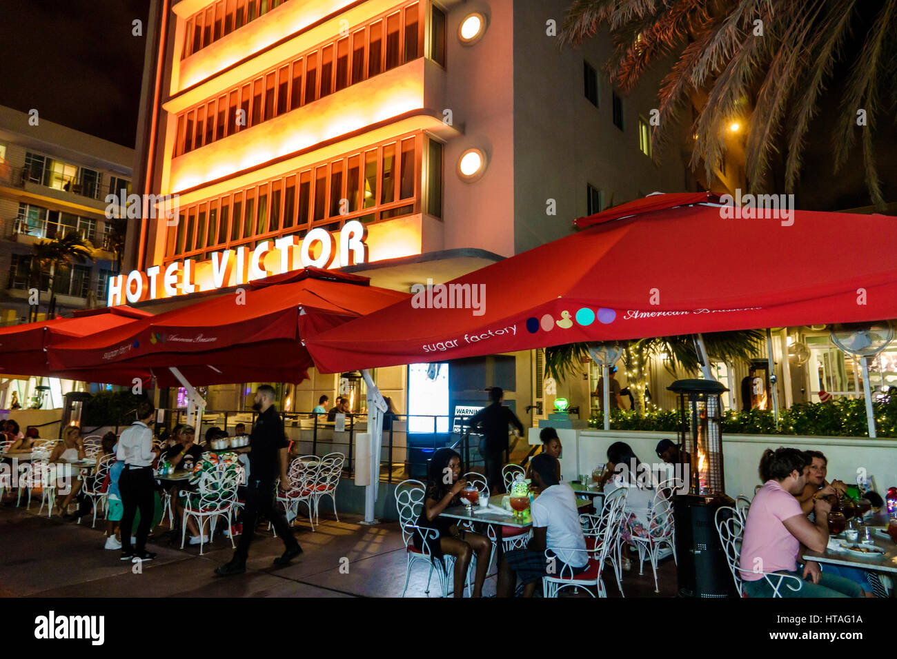 Miami Beach Florida,Ocean Drive,Art Deco Historic District,Hotel Victor,sign,Sugar Factory Brasserie,restaurant restaurants food dining cafe cafes,sid Stock Photo