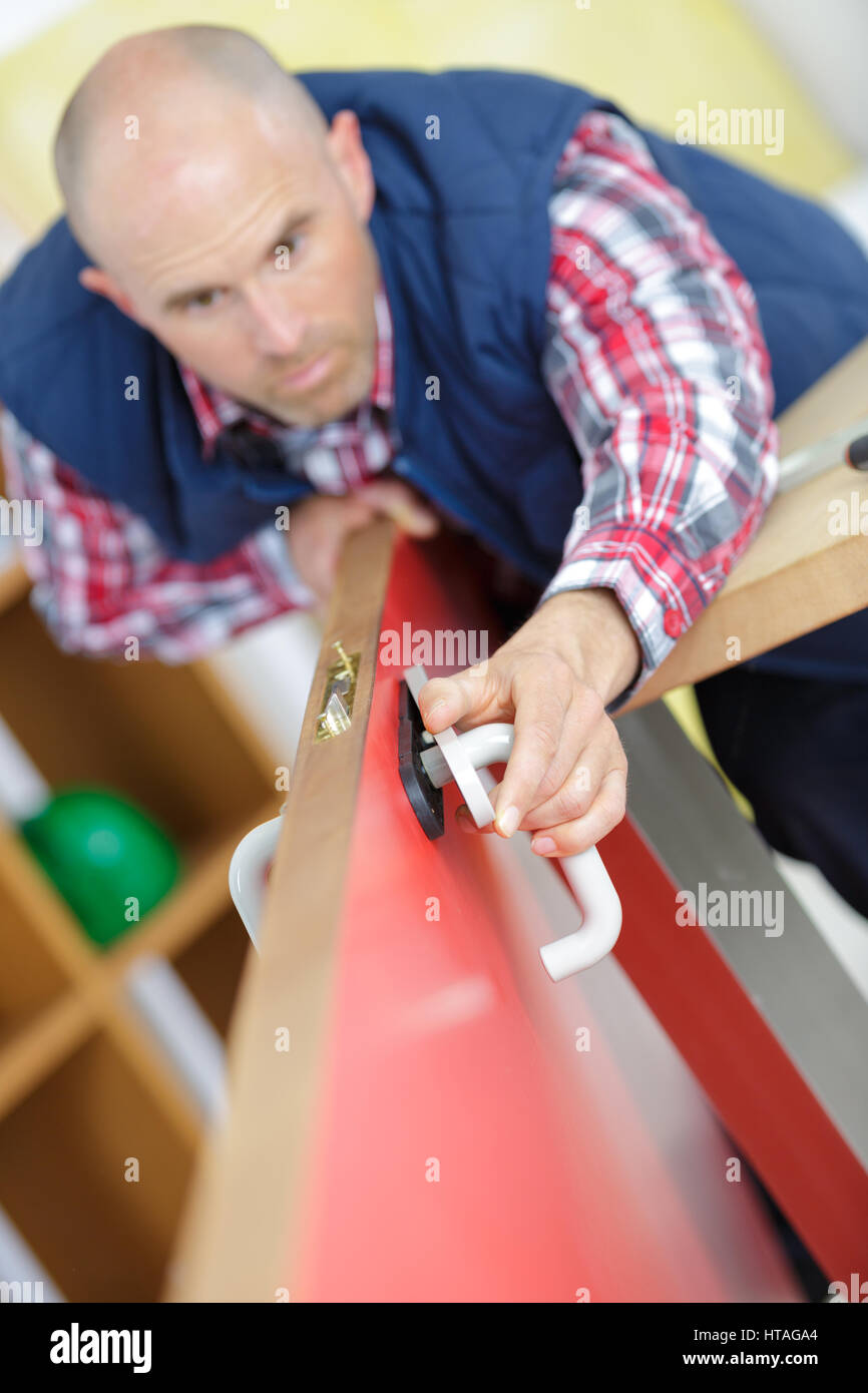 putting the knob Stock Photo Alamy