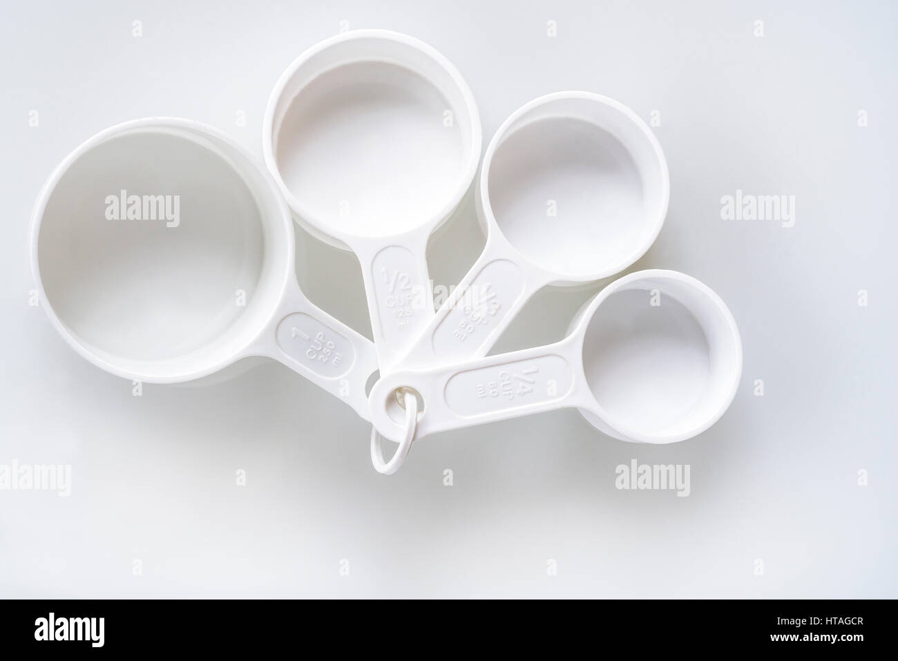 Four plastic measuring cups baking cooking measurement equipment Stock Photo Alamy
