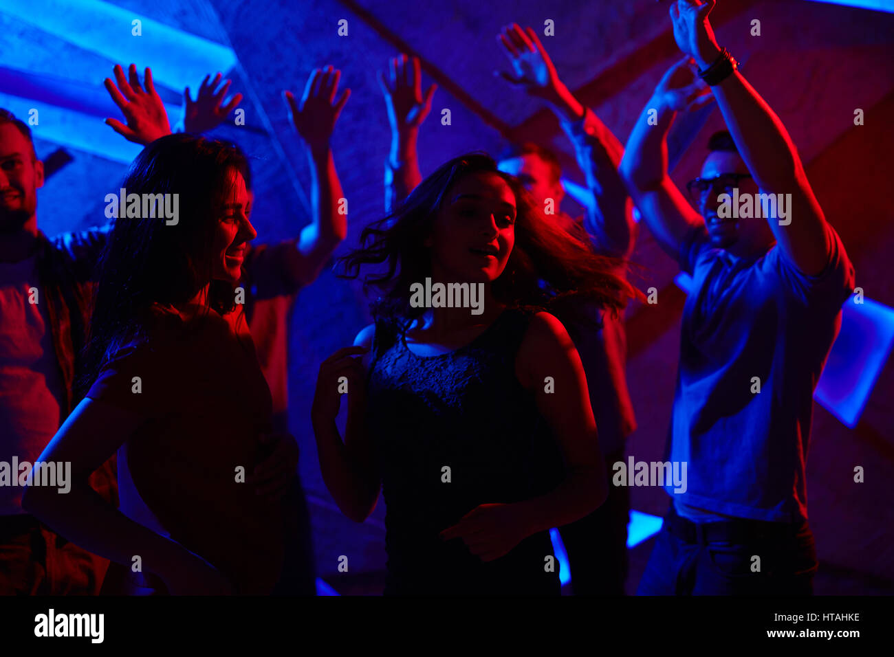 people dancing in a night club enjoying themselves Stock Photo - Alamy