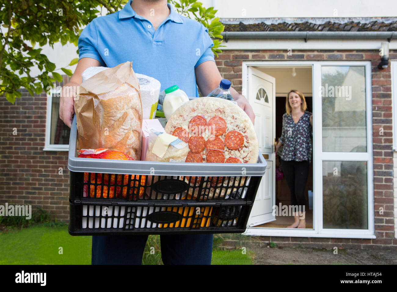 Home delivery grocery driver shopping hires stock photography and