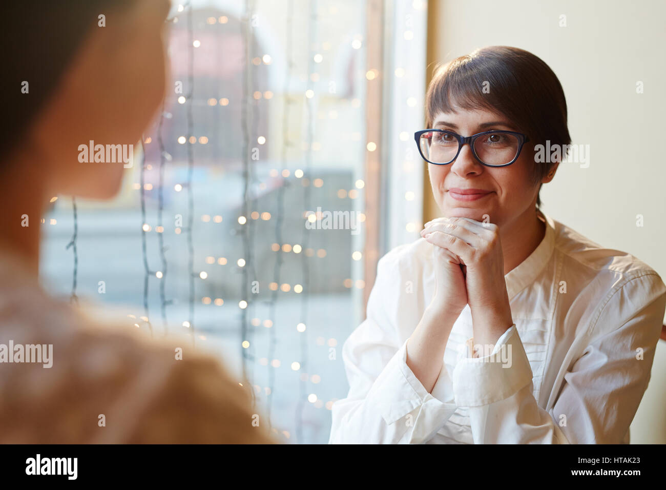 Portrait Of Young Businesswoman With Short Haircut And Glasses Looking 