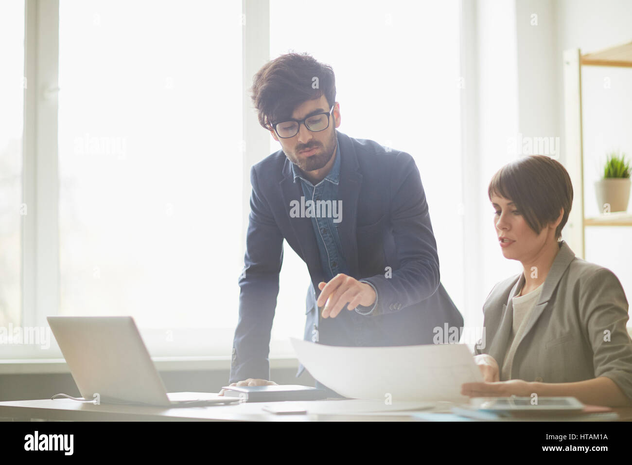 Desk project supervisor plans hi-res stock photography and images - Alamy