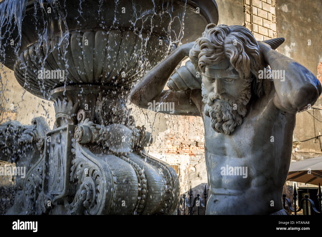 Details of Amenano Fountain (Fontana dell Amenano) next to Cathedral