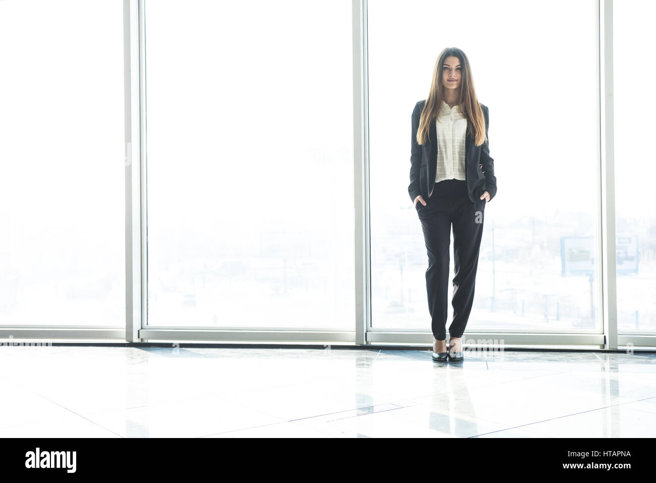 Office lady standing hi-res stock photography and images - Alamy