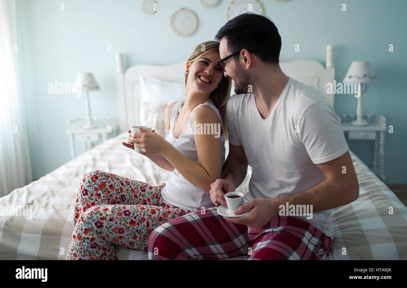 Couple enjoying their romantic morning and coffee Stock Photo - Alamy