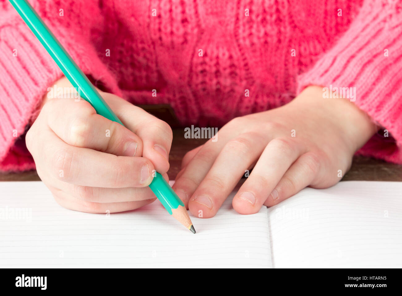 Child S Hand With Pencil Starting To Write On A Blank Exercise Book Stock Photo Alamy Child S Hand With Pencil Starting To Write On A Blank Exercise Book Stock Photo Alamy
