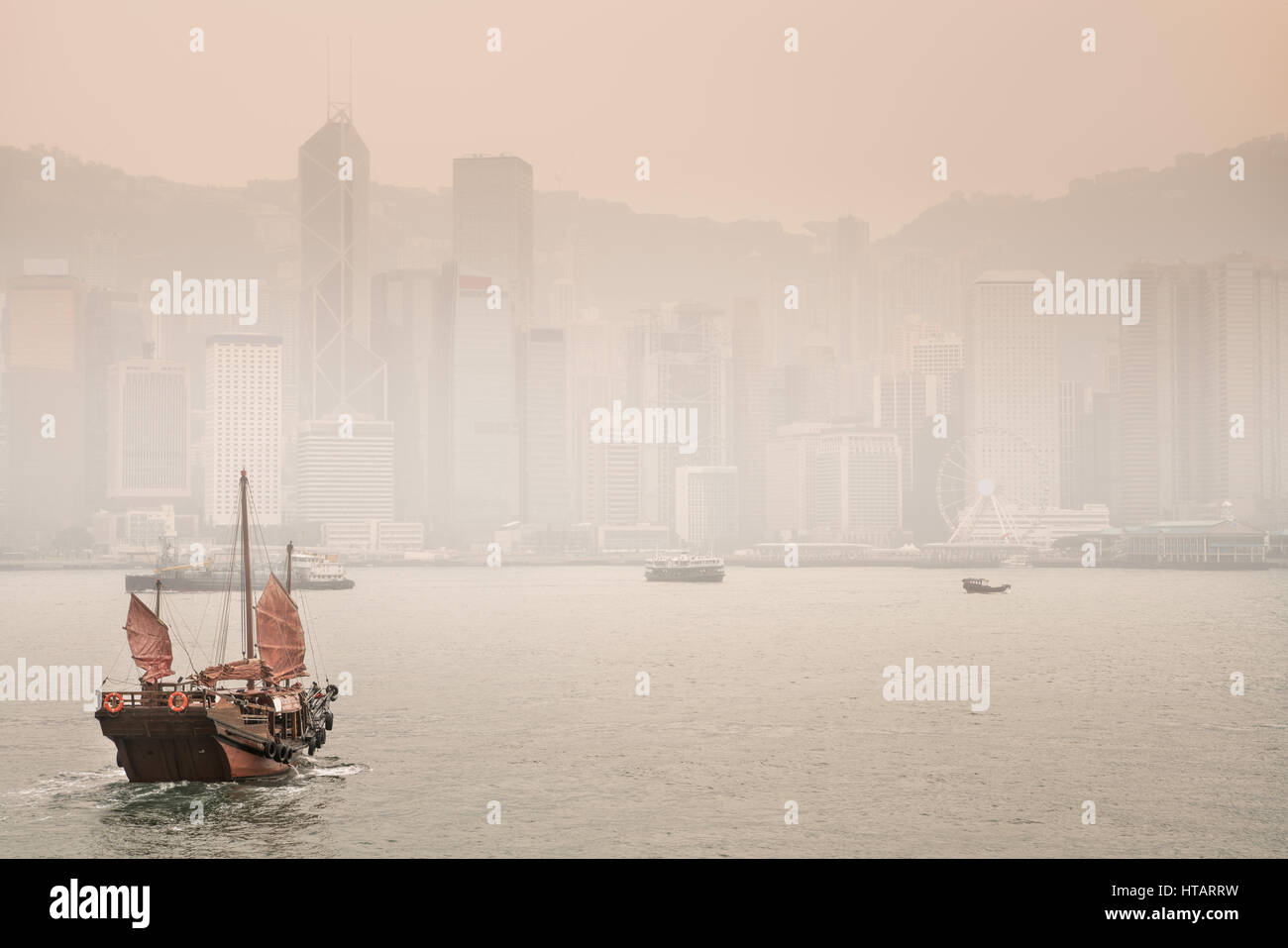 Victoria Harbour with the skyscrapers and the Hong Kong skyline. China. Stock Photo