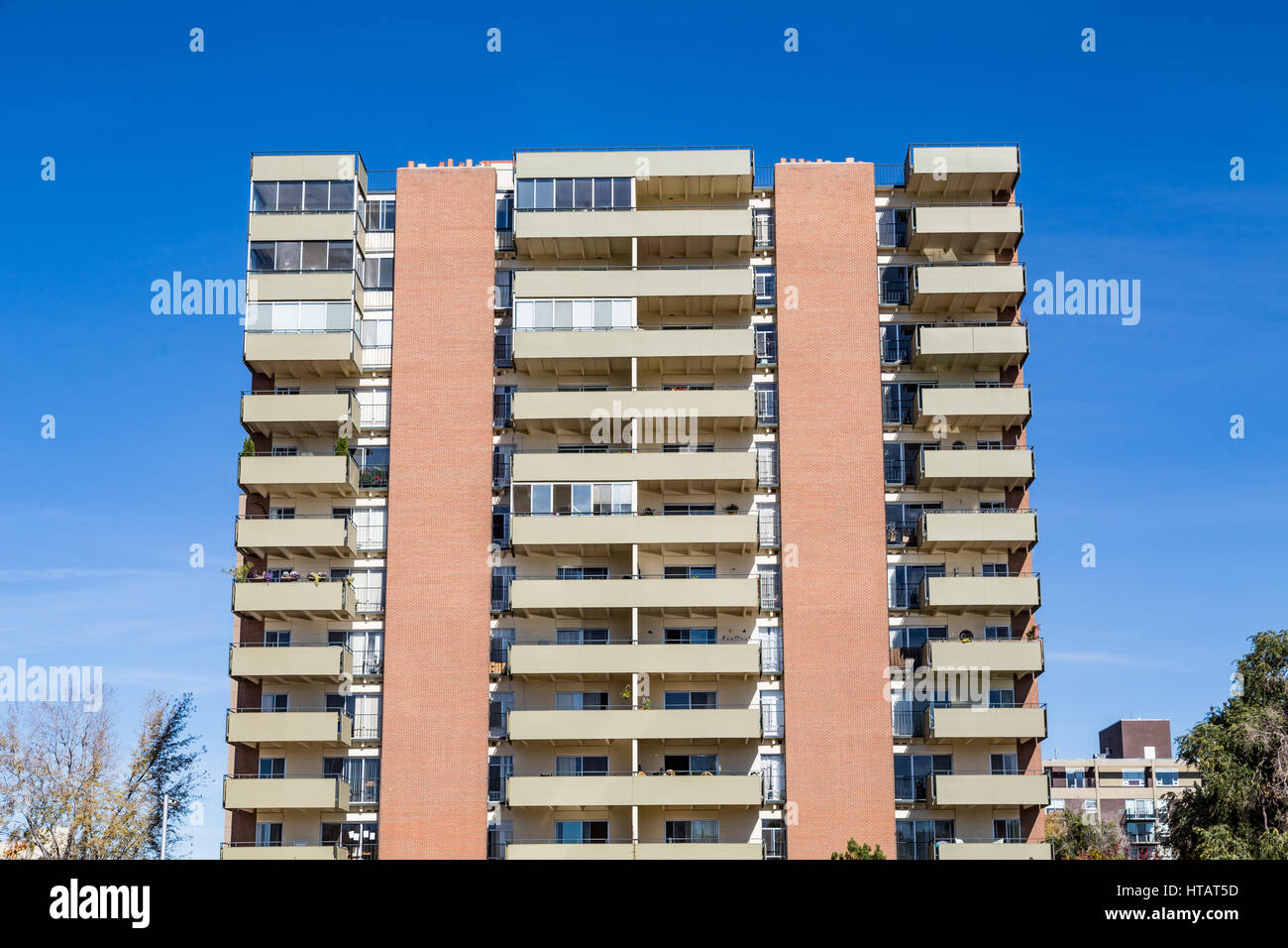 Modern Apartment Building with Balconies under Blue Skies Stock Photo ...
