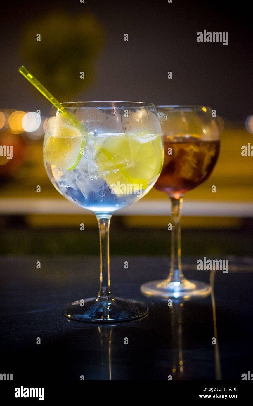A gin and tonic and a Martini drink Stock Photo Alamy