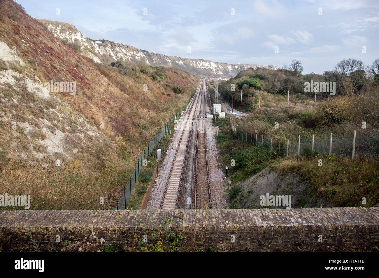 Railway travelling through The Warren towards Dover. Scene of a major rail accident in the 1950s in the UK Stock Photo