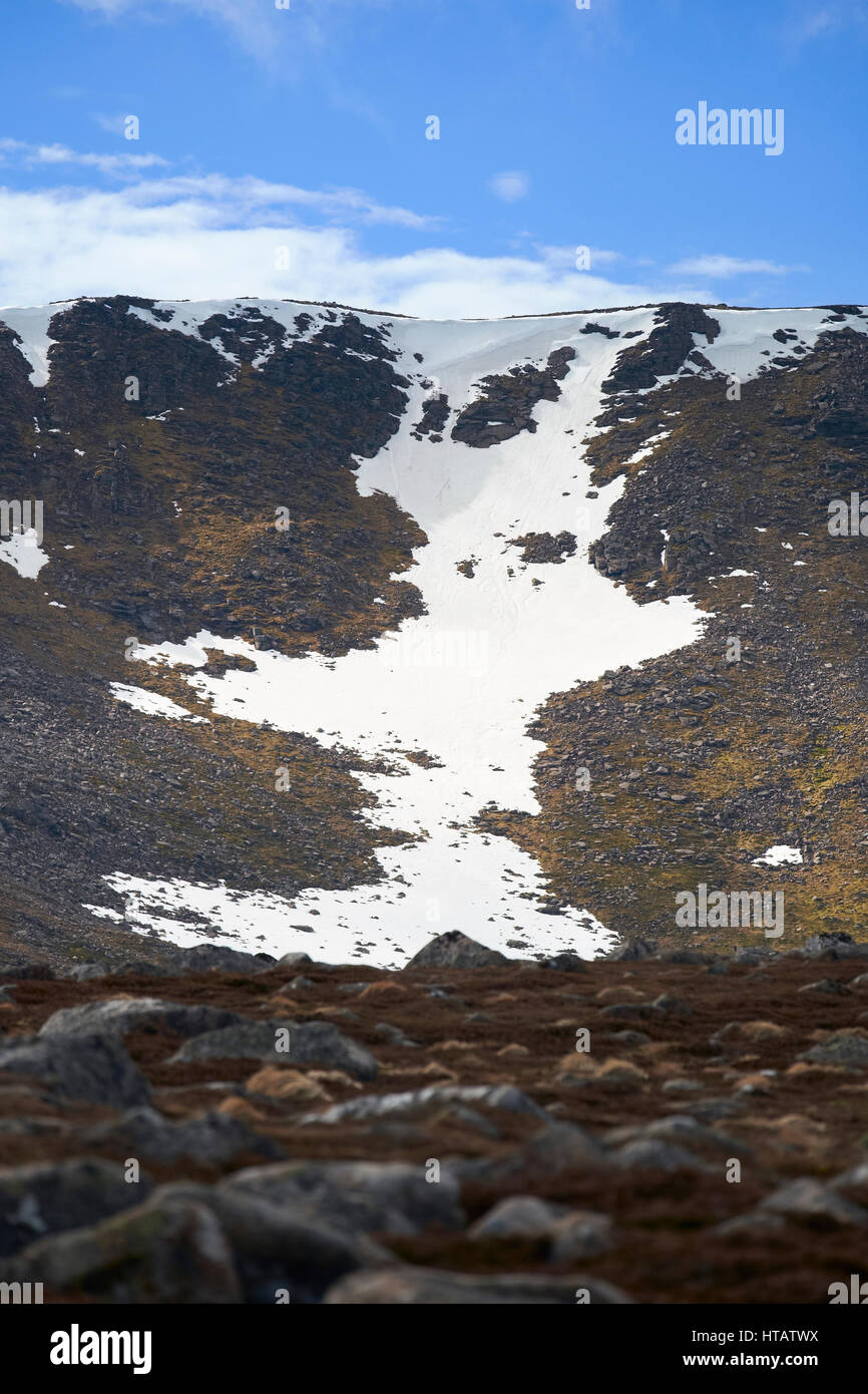 Remains of the winters snow in Coire an Lochain in the Cairngorms, Scottish Highlands. UK. Stock Photo