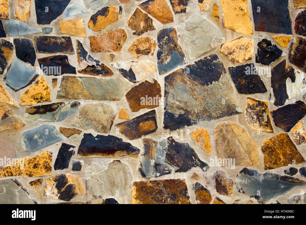 Close-up image of a stone wall Stock Photo - Alamy