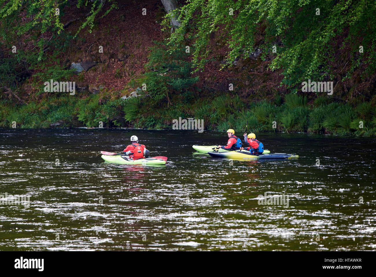 Water sports. Kayaking on the River Dee, Scottish Highlands, UK. Stock Photo