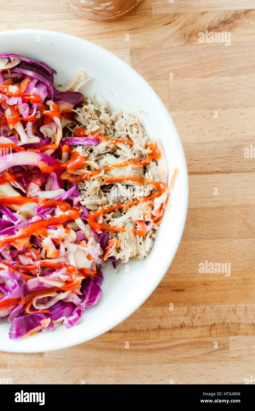 Shredded Pork Bowl With Cabbage Slaw and Spicy Sauce Stock Photo