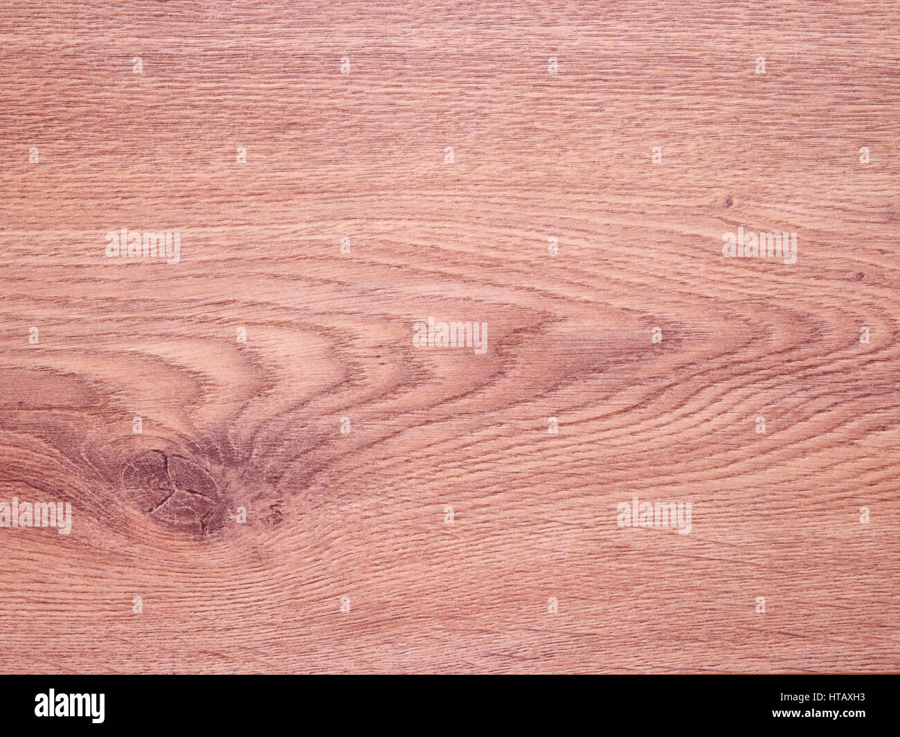 Vertical, top down aerial view of a wood laminate wood plank, textured
