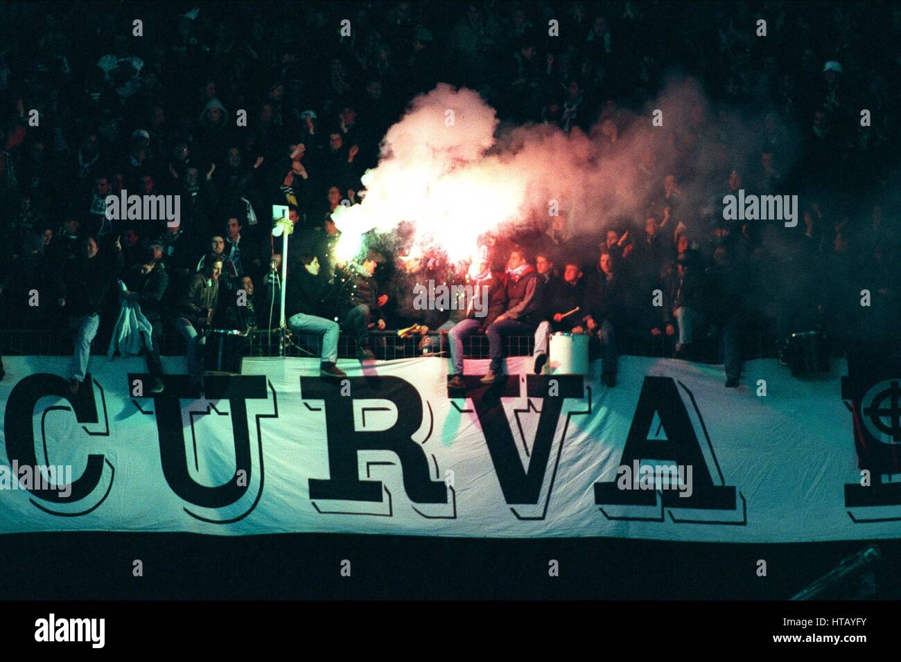 JUVENTUS FANS WITH FLARES JUVENTUS V PARMA 07 February 1999 Stock Photo
