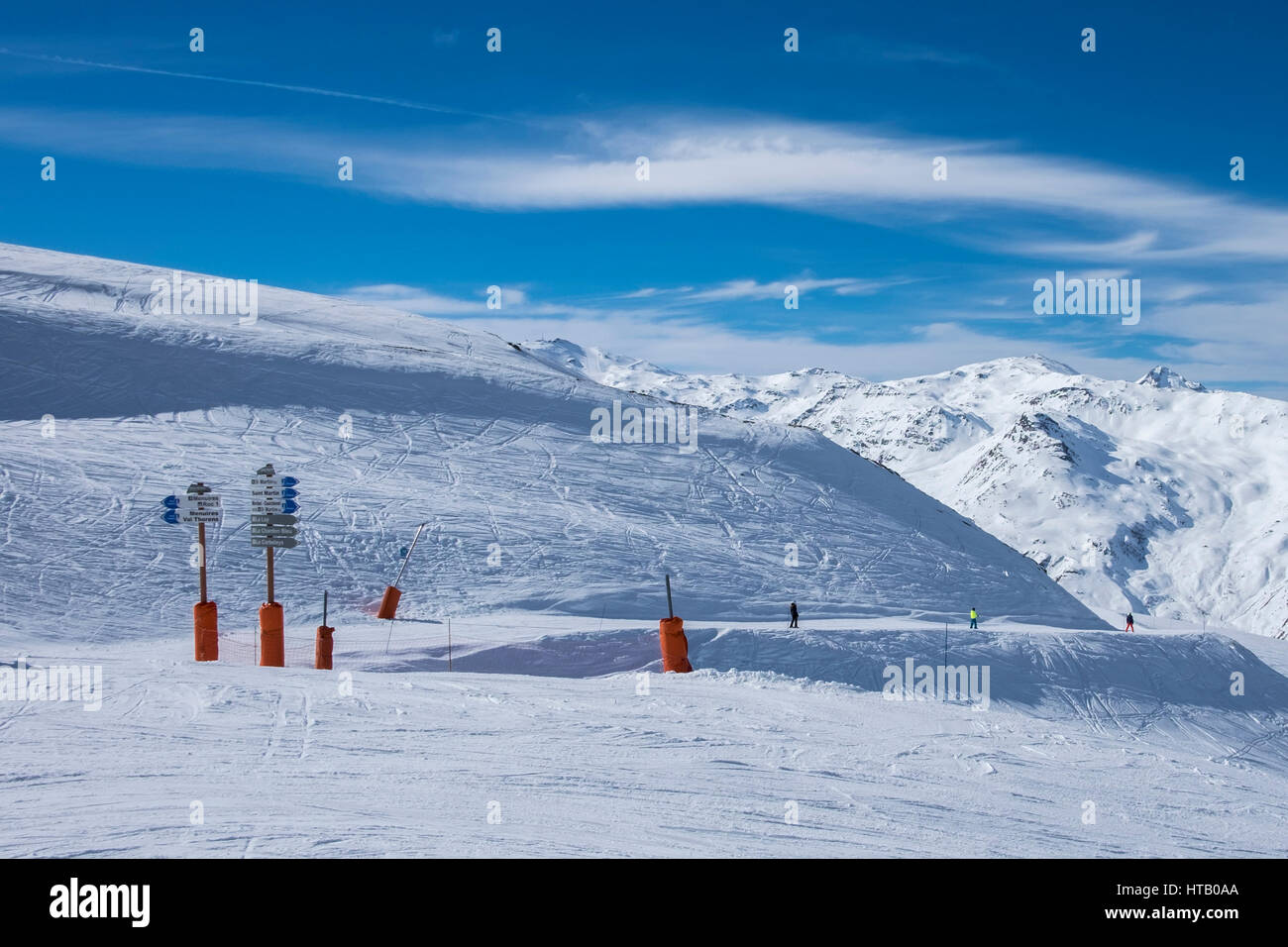 Piste signs in Meribel, Three Valleys ski resort in the French Alps, on a sunny, clear day in