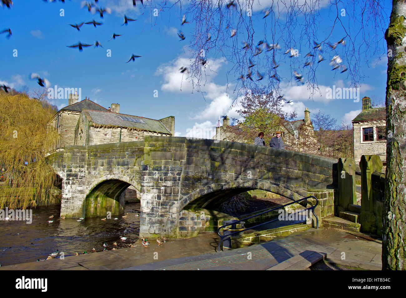 The ancient packhorse bridge over the river Wharfe in Hebden Bridge West Yorkshire Stock Photo