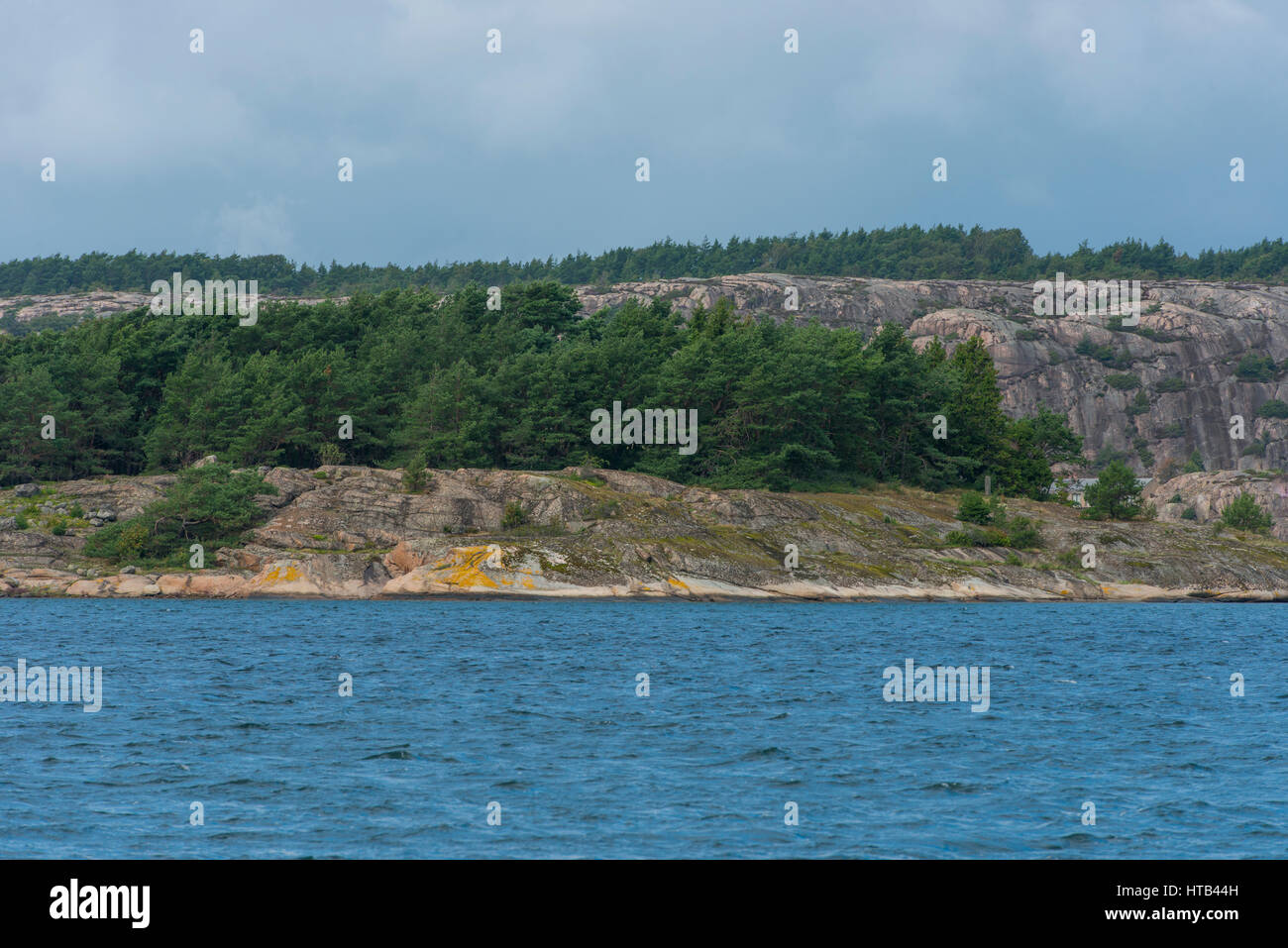 Rocky islands and summerhouses in the arcipelago around Fjällbacka, Sweden Stock Photo
