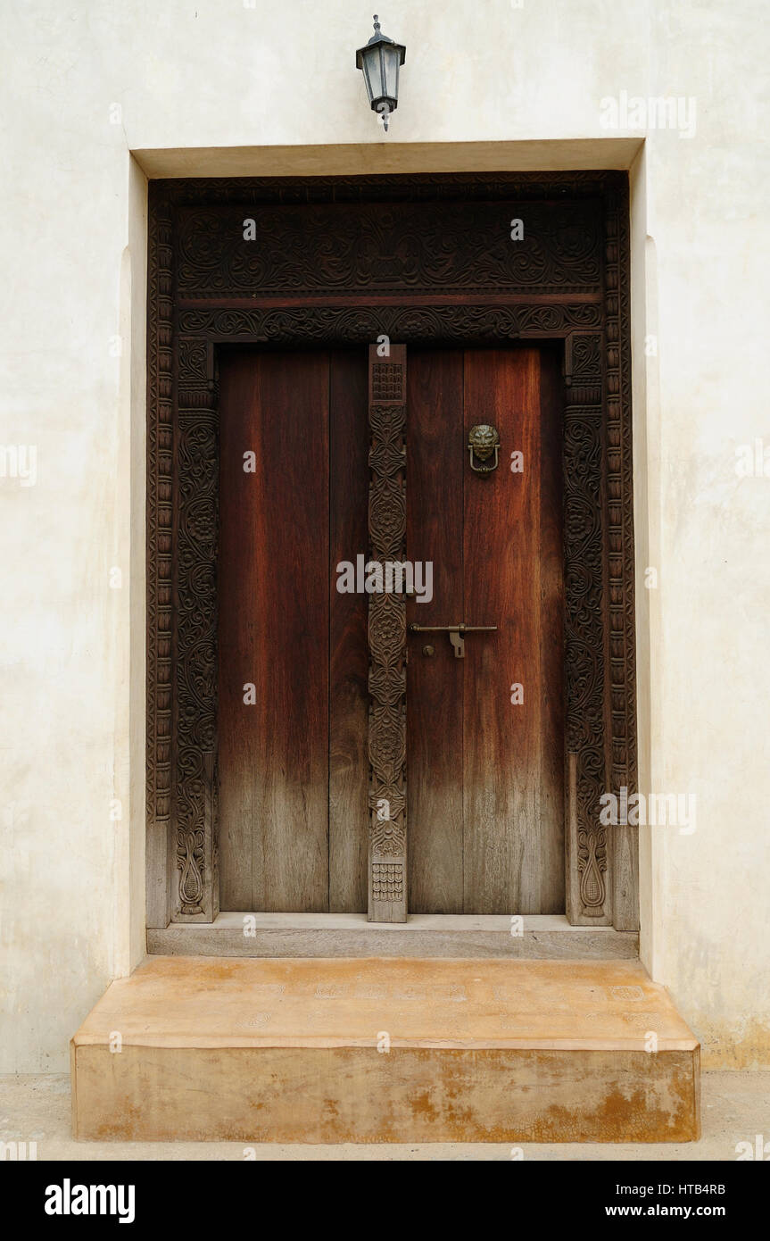 Traditional carved wooden door in Lamu Town, Kenya Stock Photo