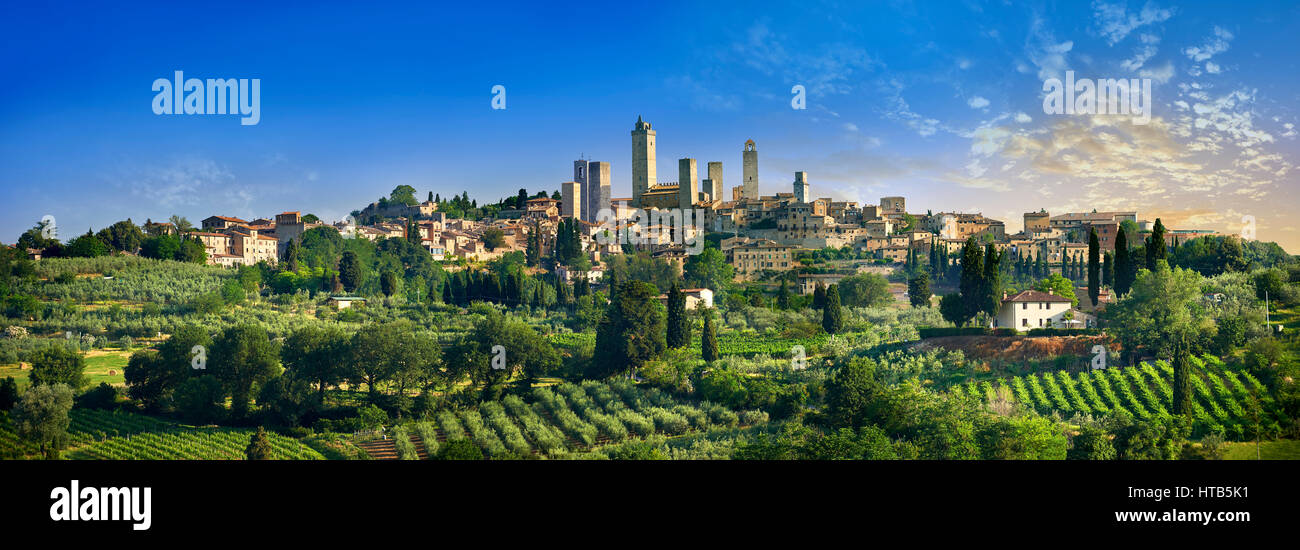 Panoramic view of the 13th century medieval hill top town, walls and towers of San Gimignano. Tuscany Italy Stock Photo