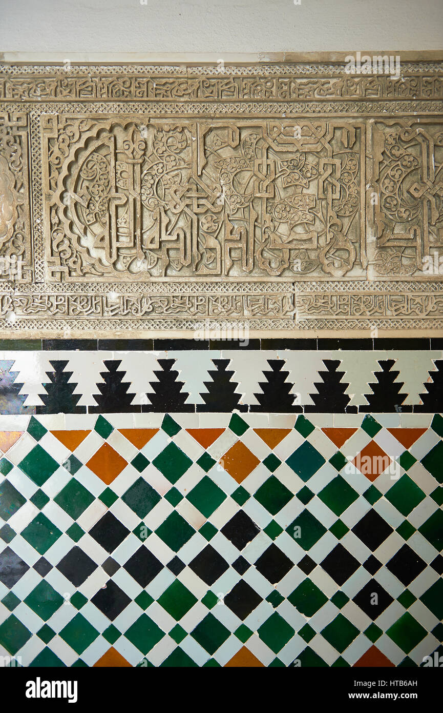 Arabesque Zellighe tiles with Mudjar plasterwork from tyhe vestibule of the Alcazar of Seville, Seville, Spain Stock Photo