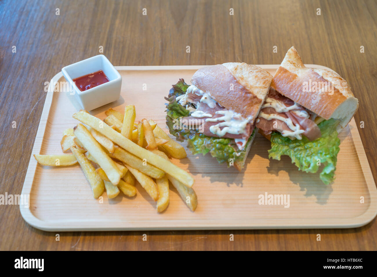 Ham and Cheese Sandwich with French Fries Stock Photo