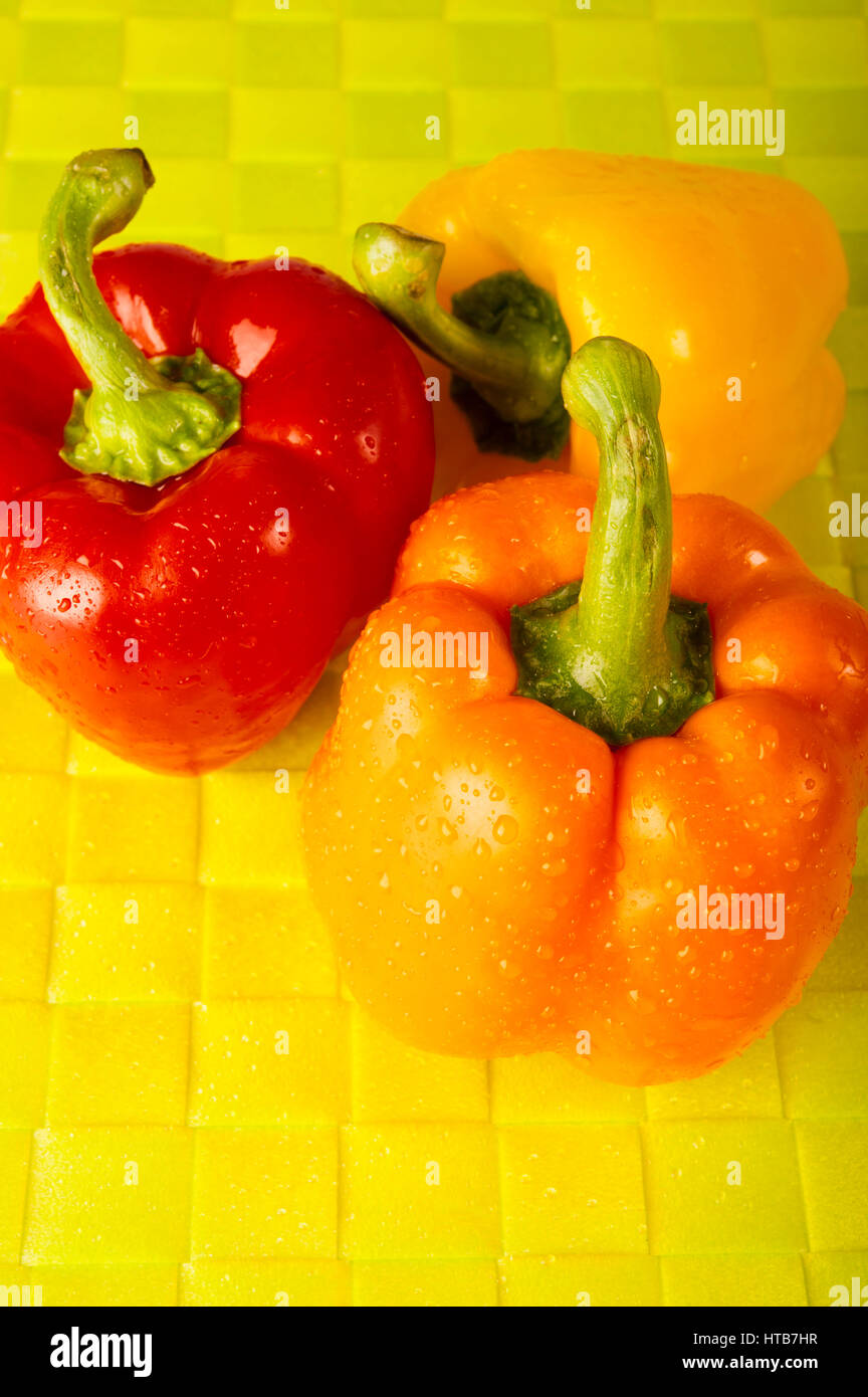 red and yellow sweet peppers Stock Photo - Alamy