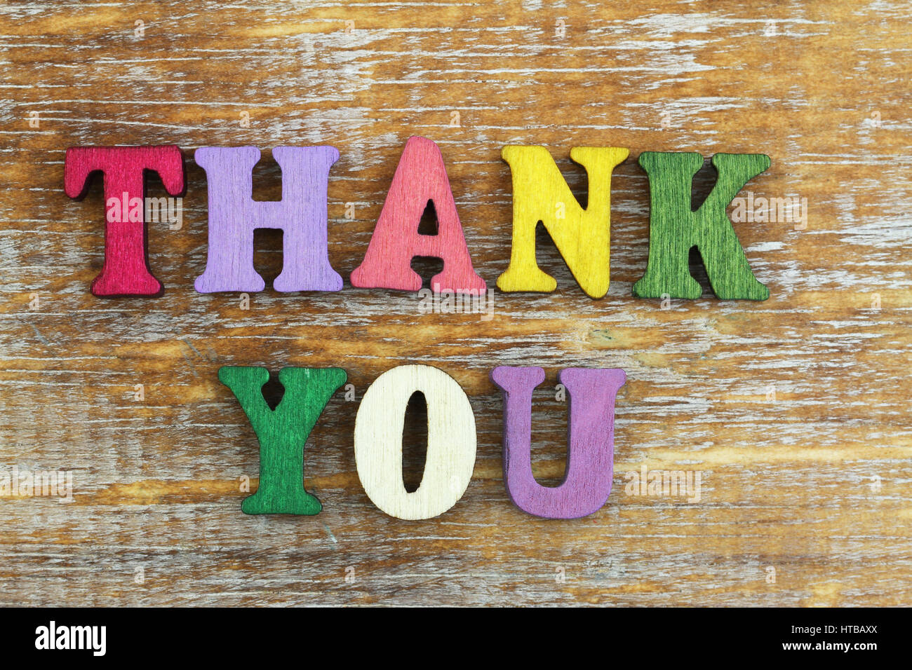 Thank you written with colorful wooden letters Stock Photo