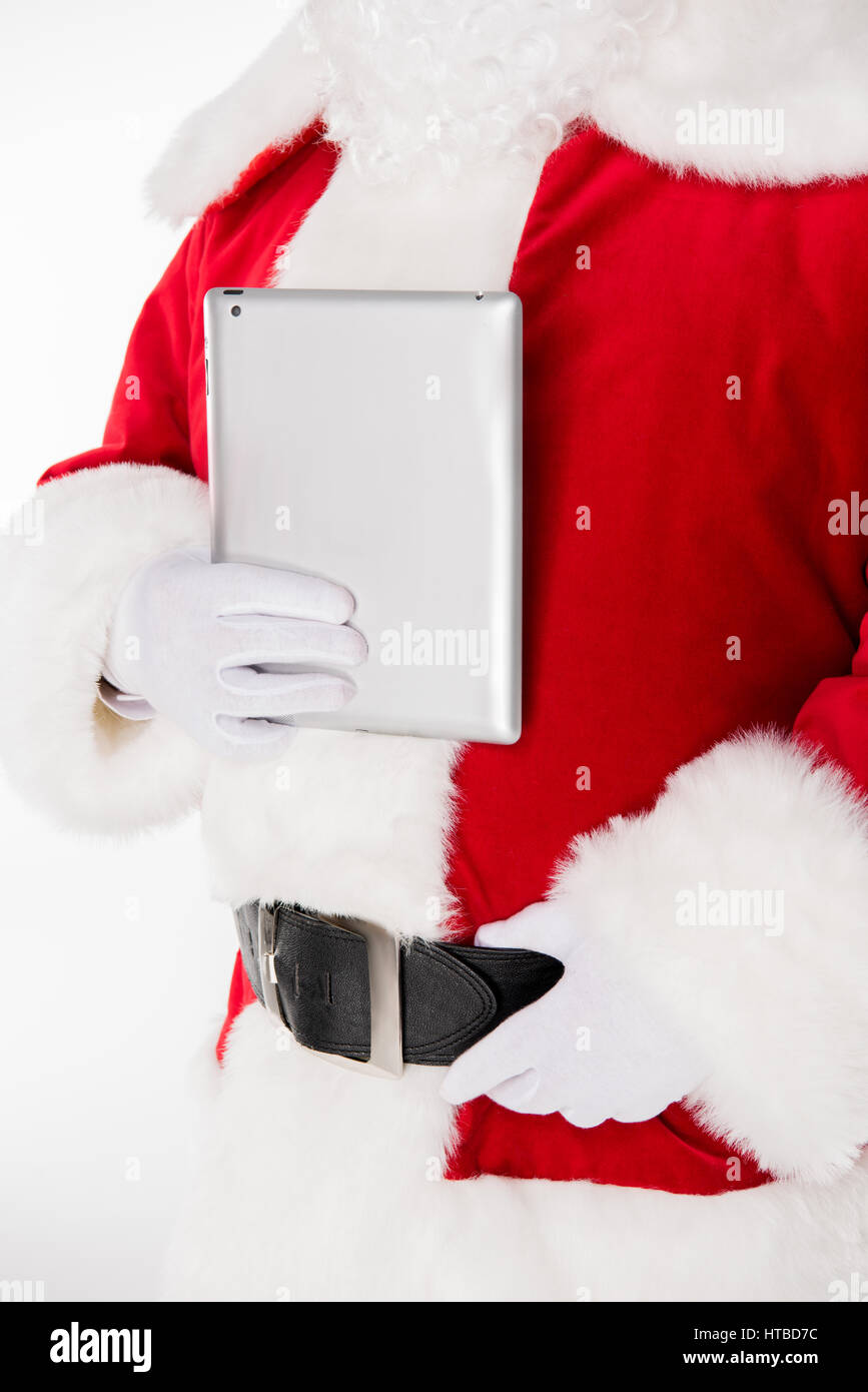 Cropped image of Santa Claus posing with digital tablet in hand Stock ...