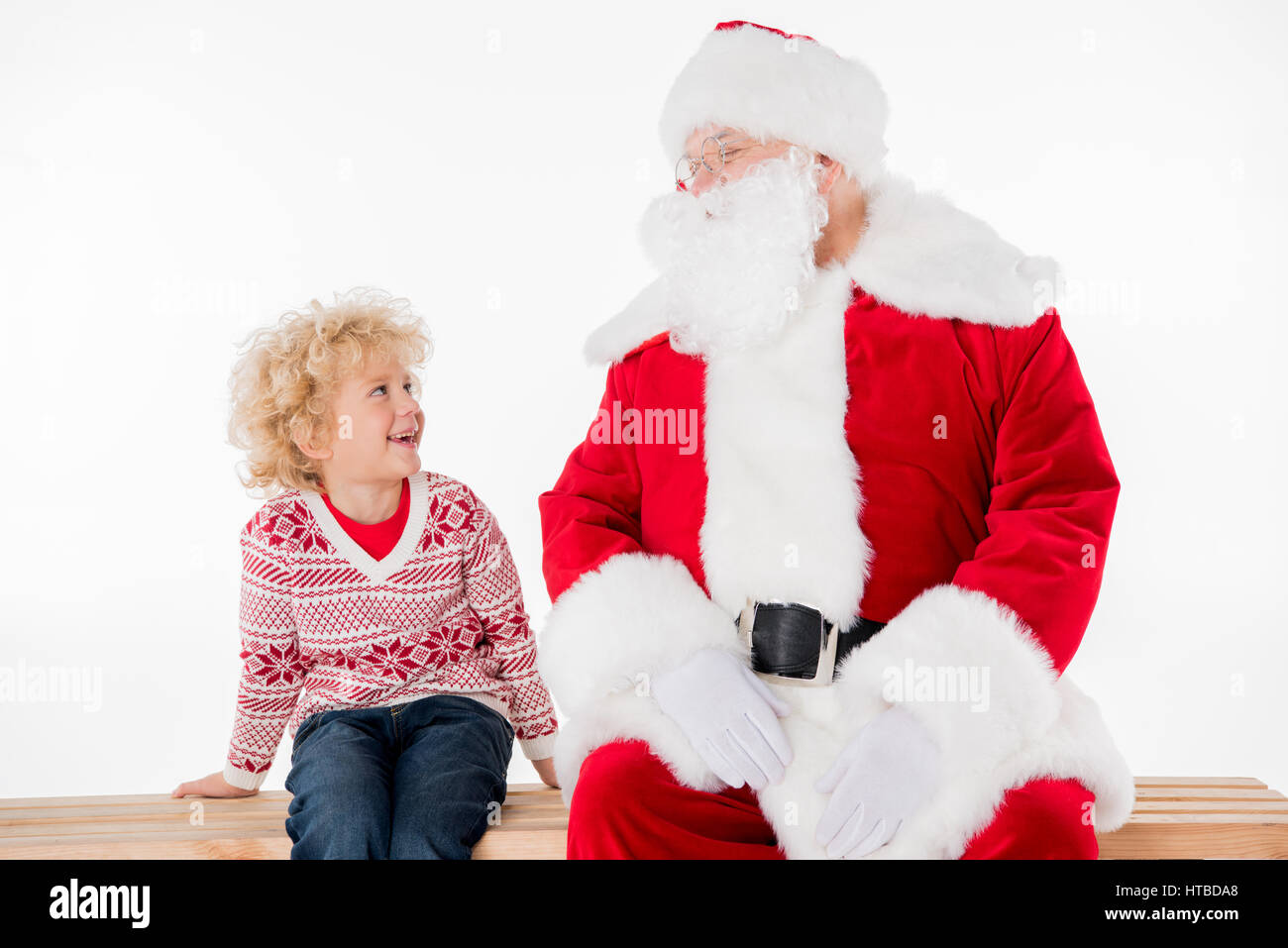 Santa claus sitting on a bench hi-res stock photography and images - Alamy