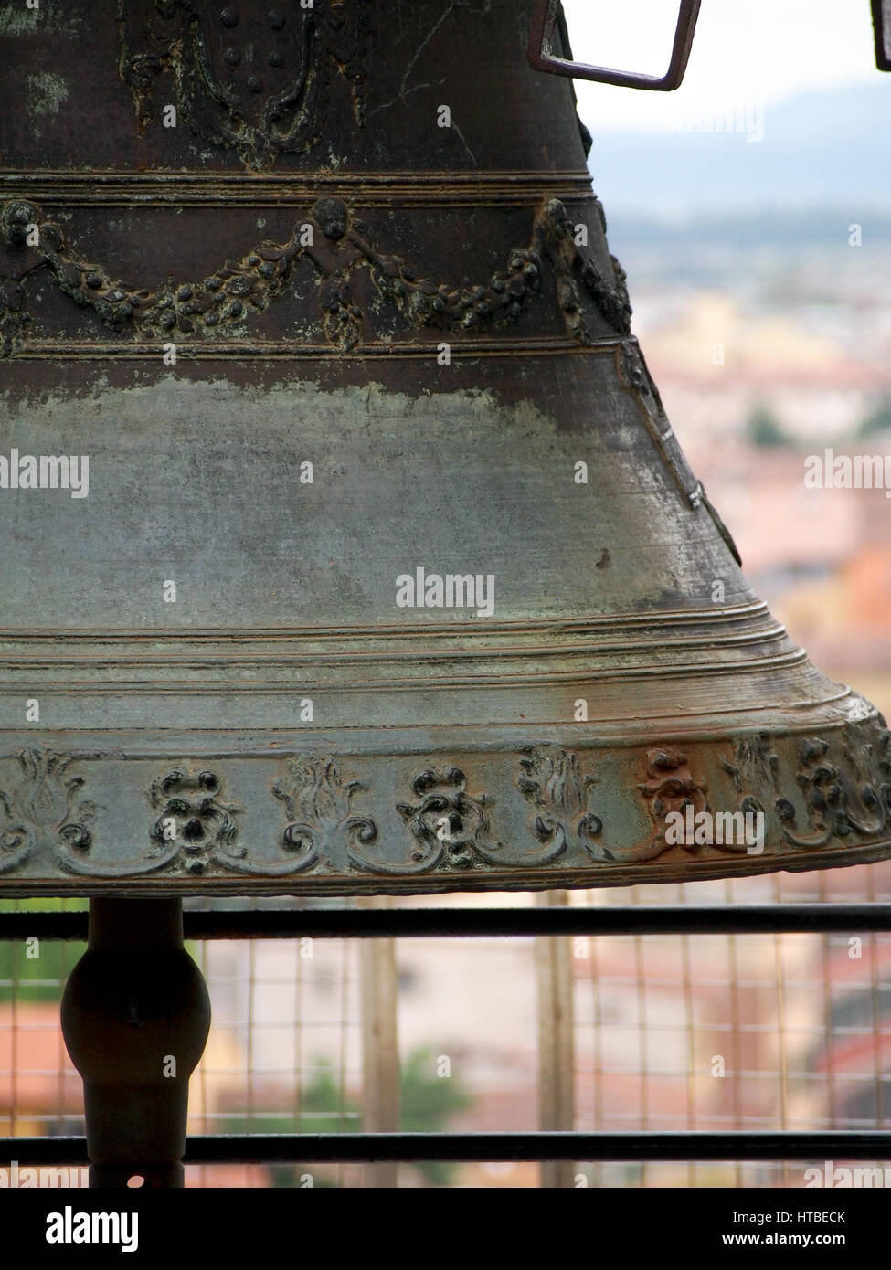 A detail of a large bell in the bell tower of the Leaning Tower of Pisa in Italy. Stock Photo