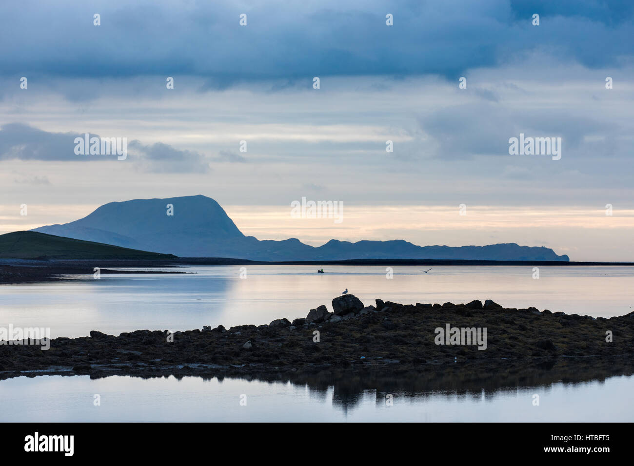A solitary boat off Clare Island, Clew Bay, Co Mayo, Ireland Stock Photo