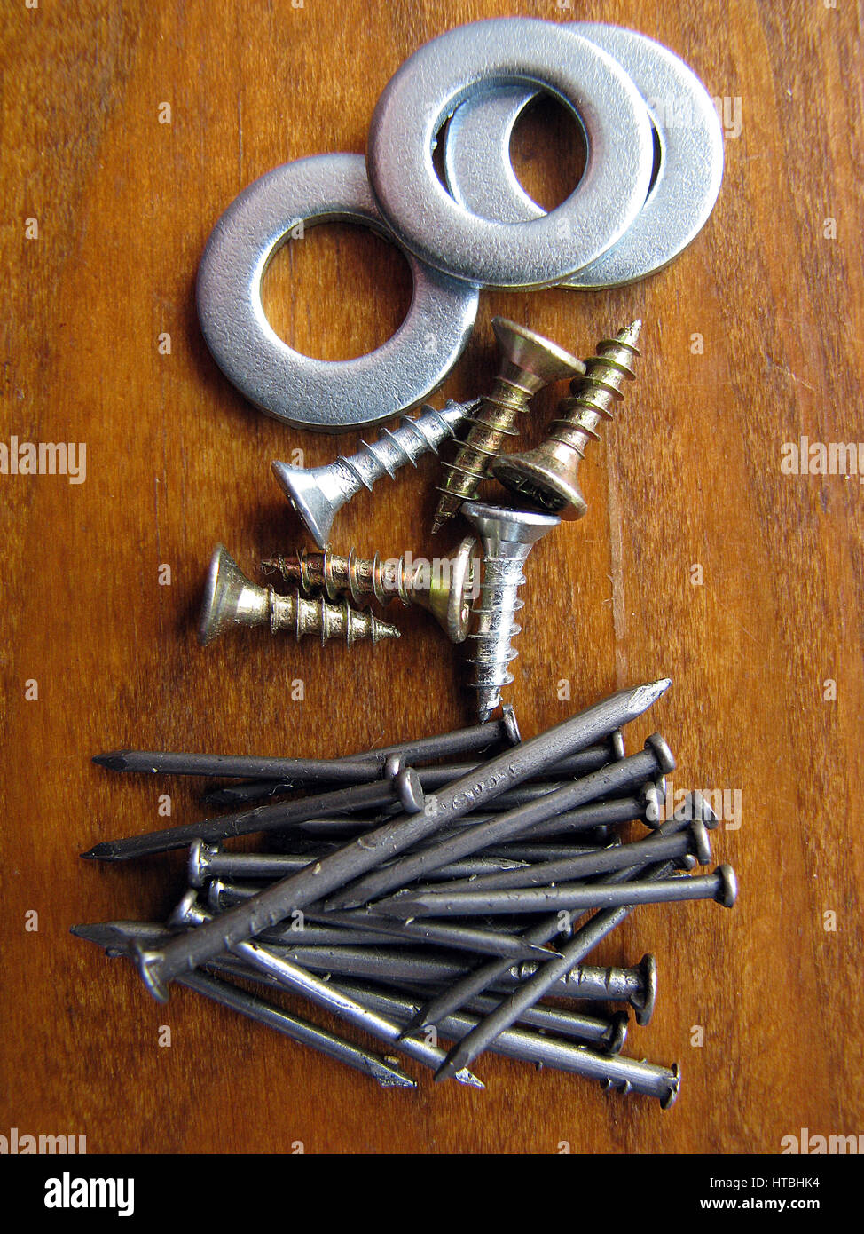 Hardware shop. Iron washers texture background. Washers, nails, self