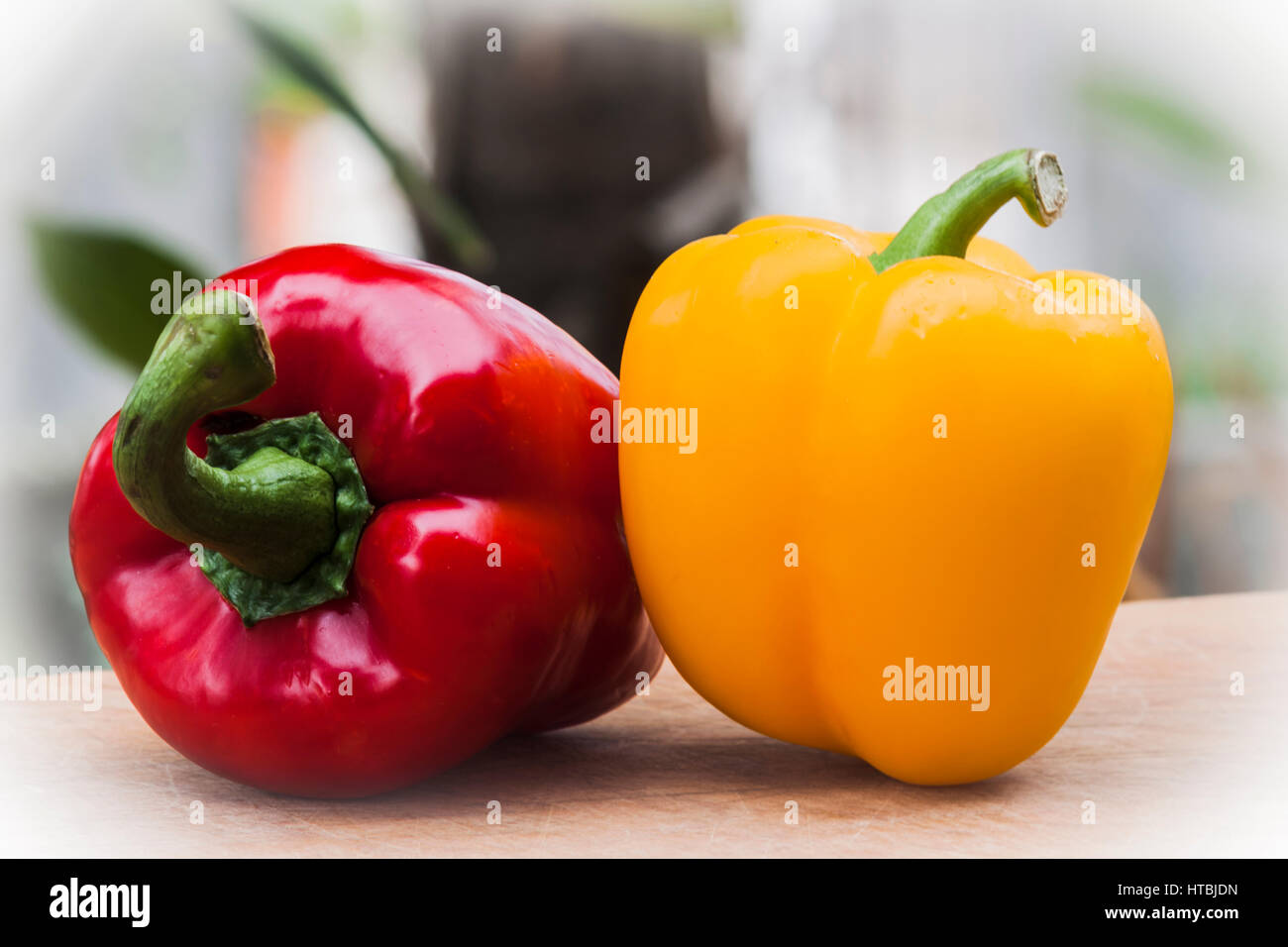 Red and yellow peppers Stock Photo - Alamy