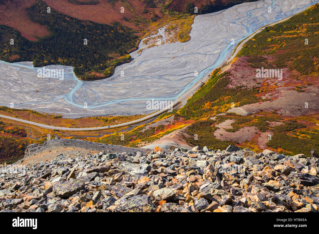 View of Phelan Creek and the Richardson Highway in autumn from high up on Rainbow Ridge in the Alaska Range; Alaska, USA Stock Photo