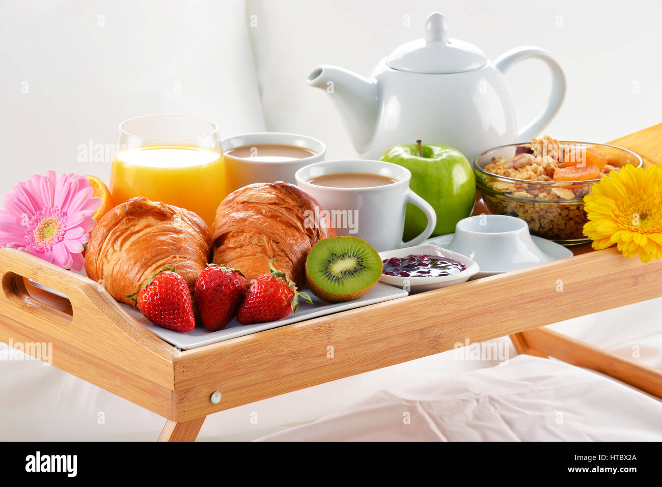 Breakfast tray in bed in hotel room Stock Photo - Alamy