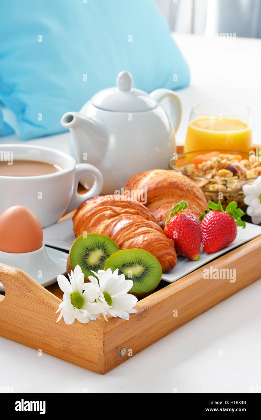 Breakfast tray in bed in hotel room Stock Photo - Alamy