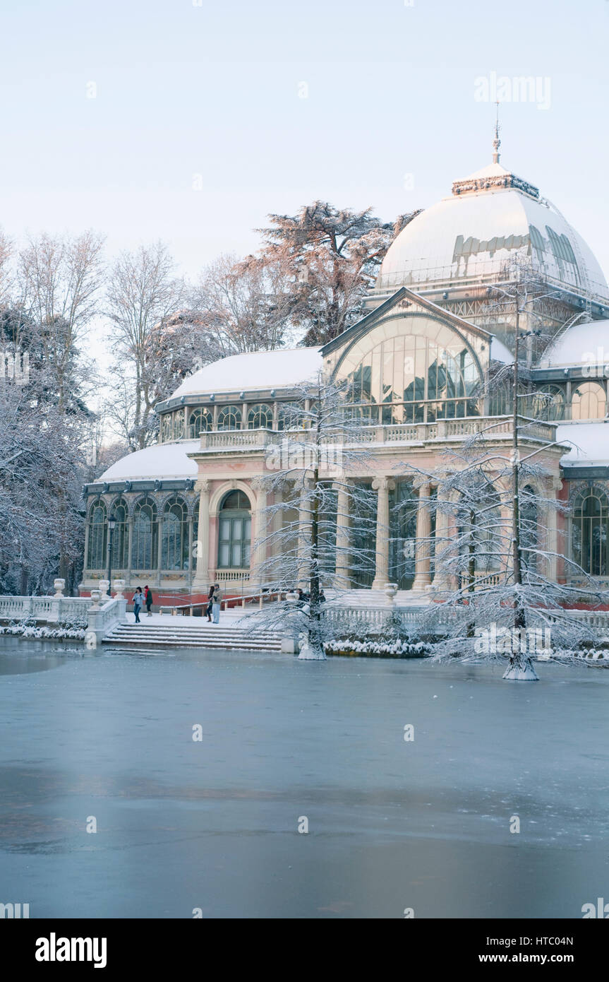 Snow covered Palacio de Cristal. The Retiro park, Madrid, Spain. Stock Photo