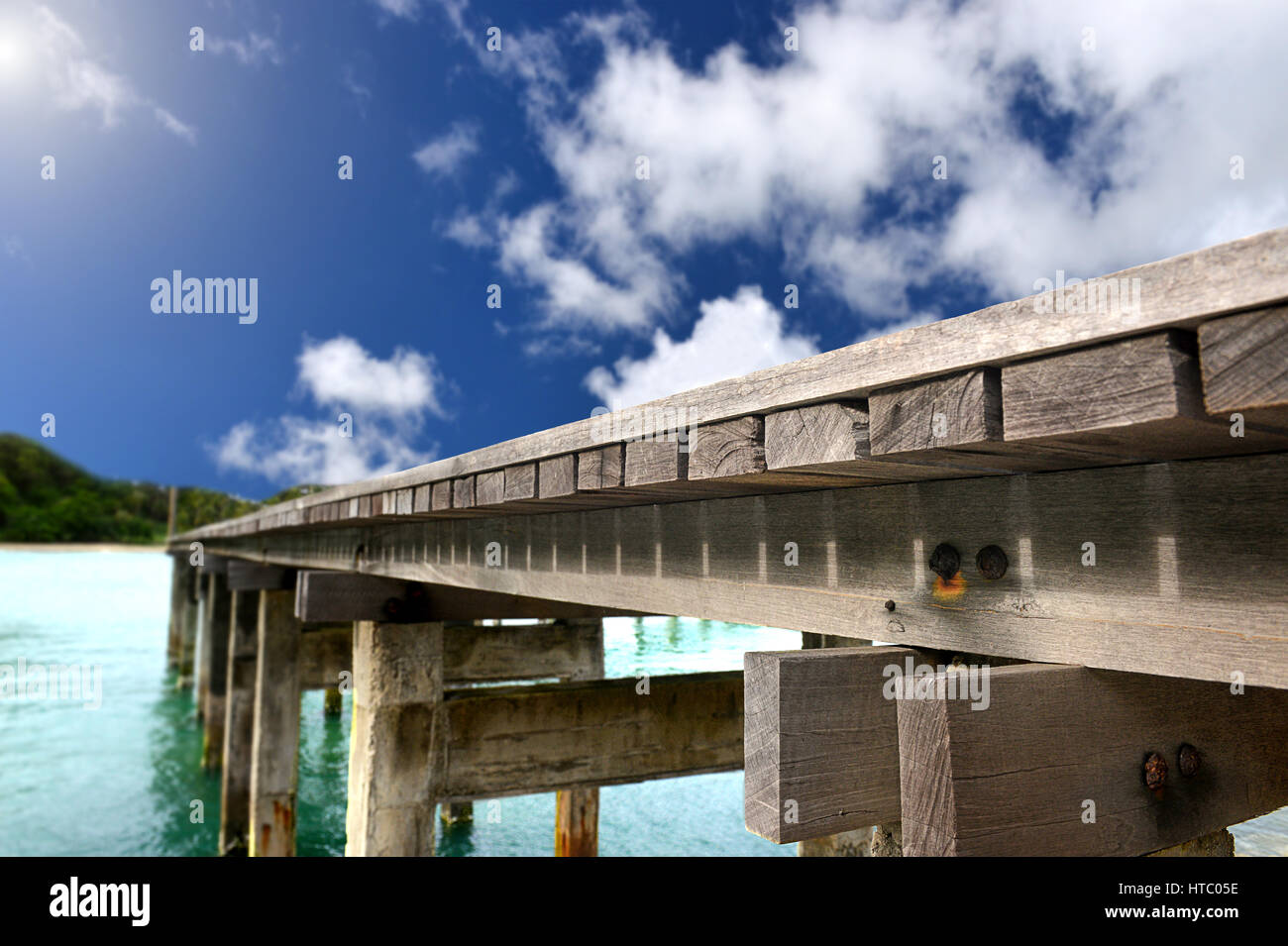 The  wooden bridge in island bay  photo in sunny day lighting Stock Photo