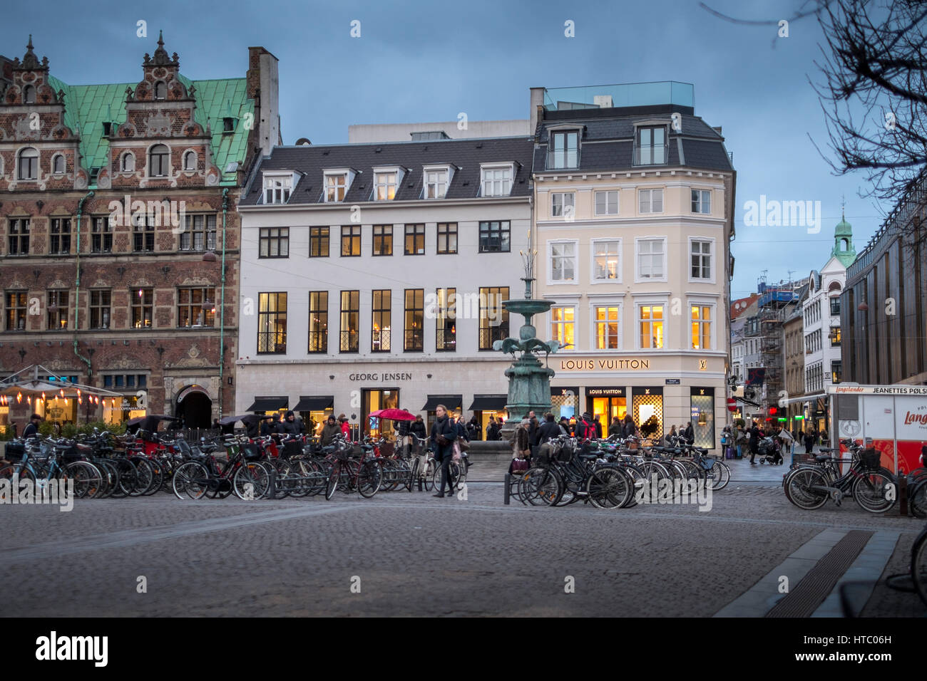 Strøget at dusk by The Stork Fountain, Copenhagen's main shopping street. Stock Photo