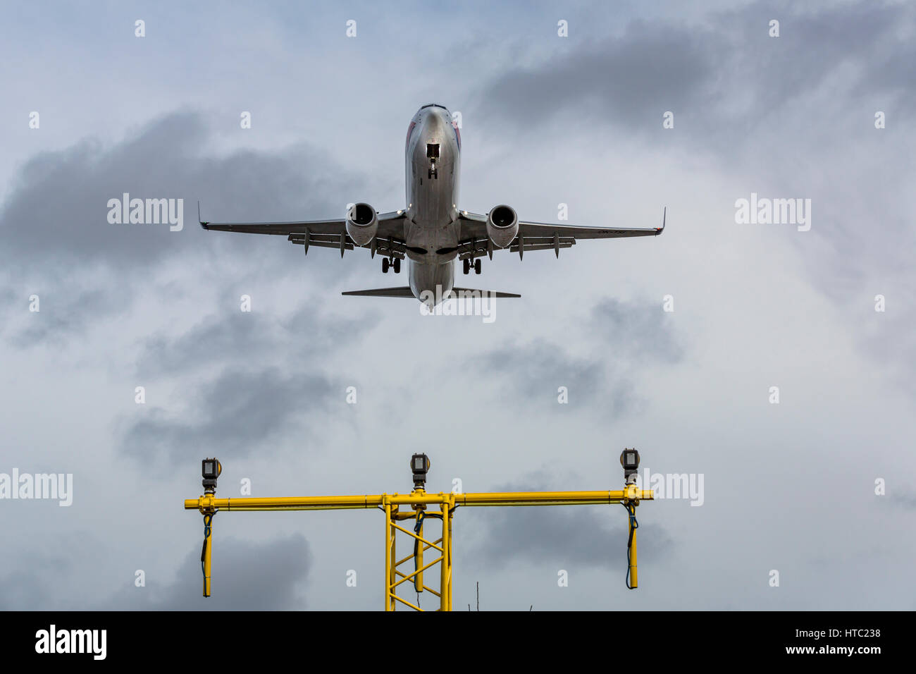 Airlines facing jet fuel price hikes and long delays due to staff covid shortages, aircraft landing at a London Gatwick airport, England UK Stock Photo