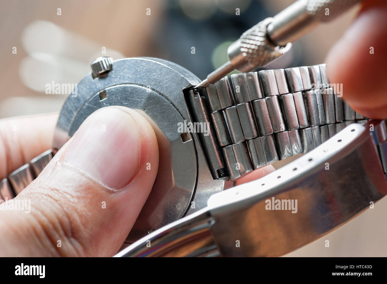 remove the spring bar with spring bar tool Stock Photo Alamy