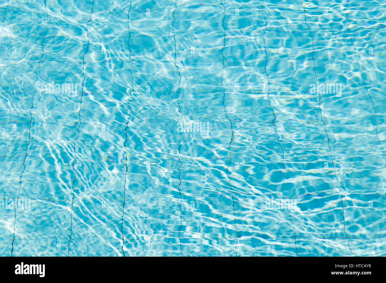 Blue ripped water in swimming pool Stock Photo - Alamy