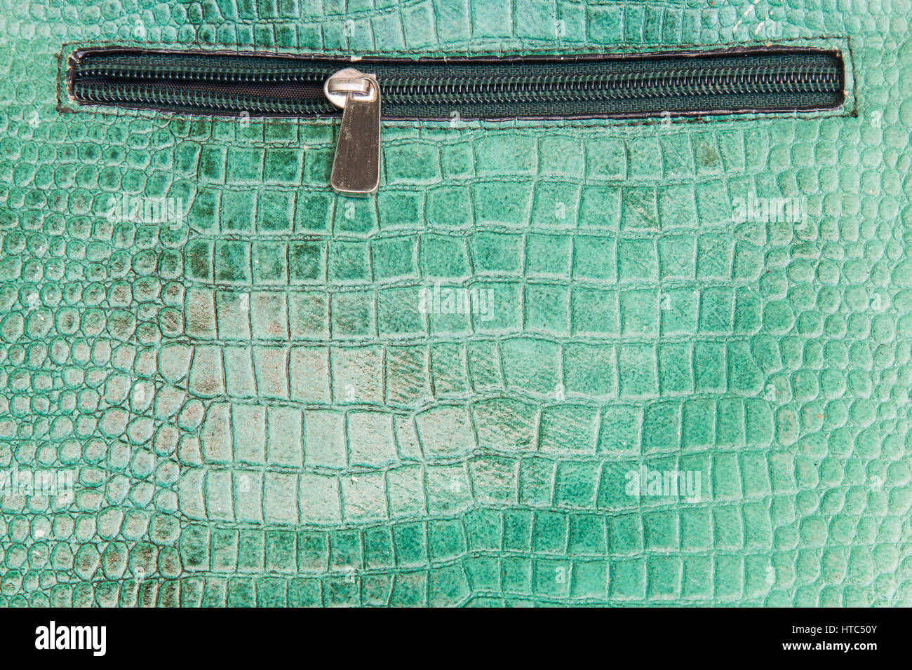 Crocodile leather texture with zipper Stock Photo Alamy