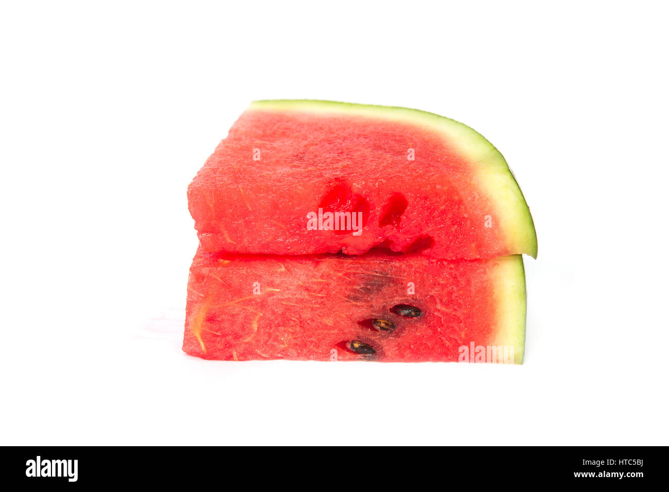 Sliced ripe watermelon isolated on white background Stock Photo - Alamy