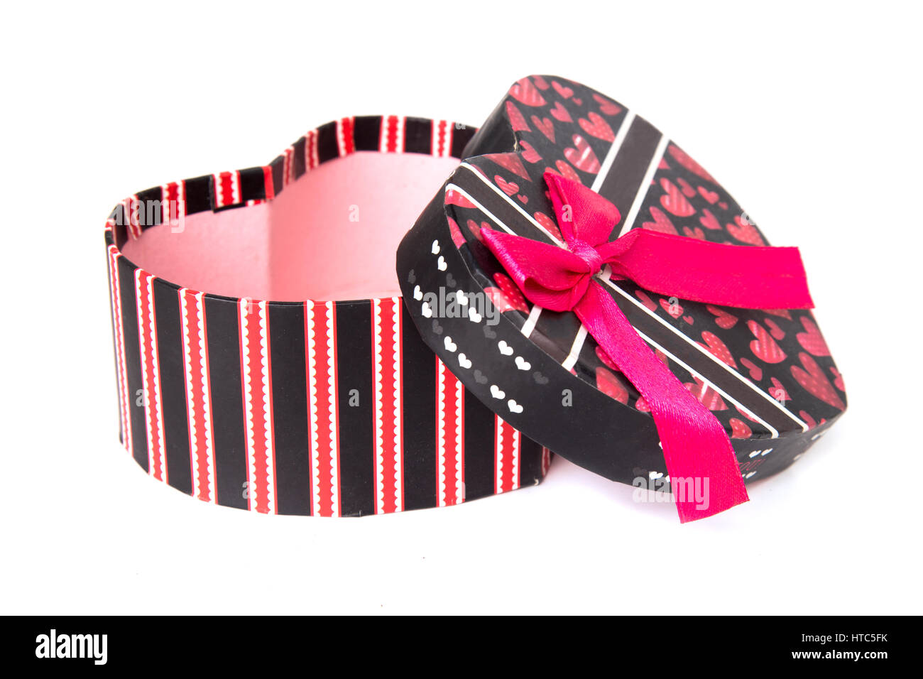 Red heart shape gift box isolated on white background. Stock Photo