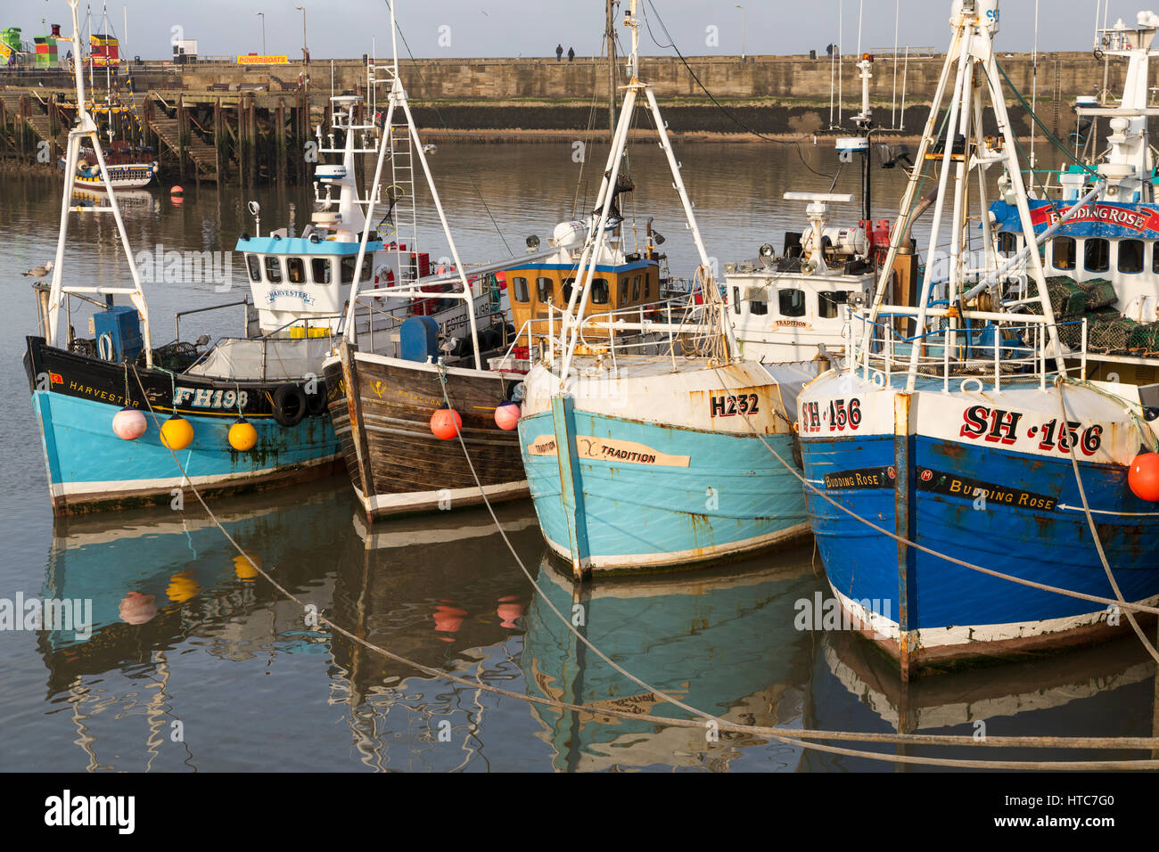 Fishing Boats moored in Bridlington Harbour North Yorkshire Coast UK Stock Photo